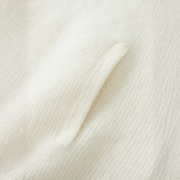 The Cortina Merino Wool Zip Knit