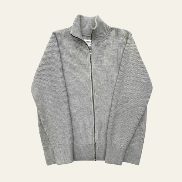 The Novara Ribbed Zip Sweater
