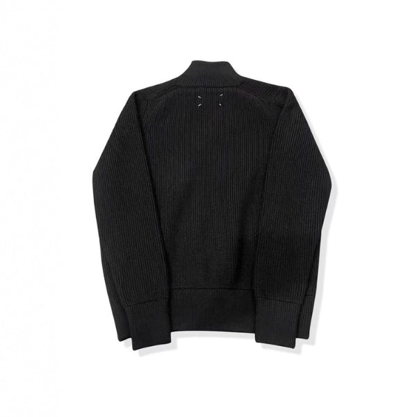 The Novara Ribbed Zip Sweater